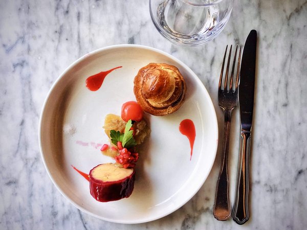 What Techniques Ensure a Perfectly Cooked Gourmet Duck Confit?